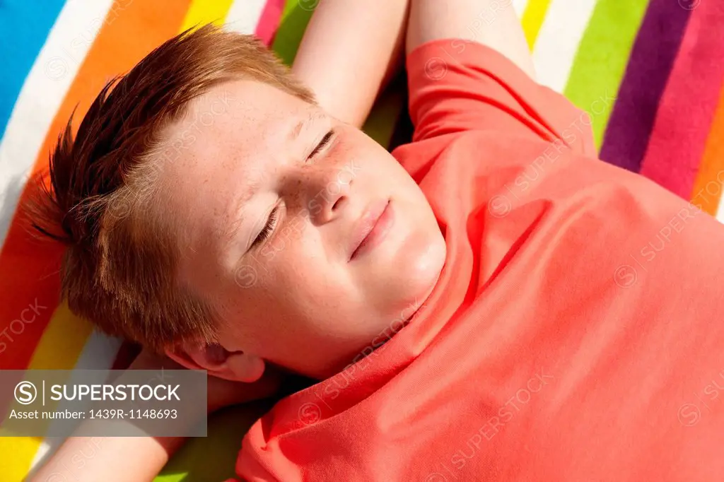 Boy sunbathing
