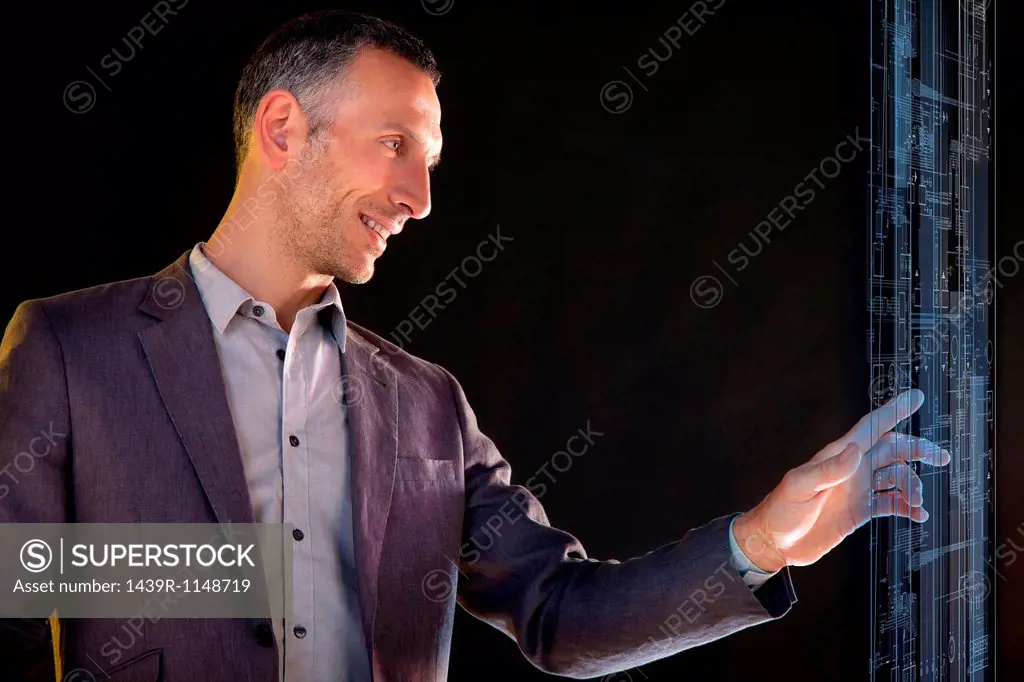 Businessman touching virtual information