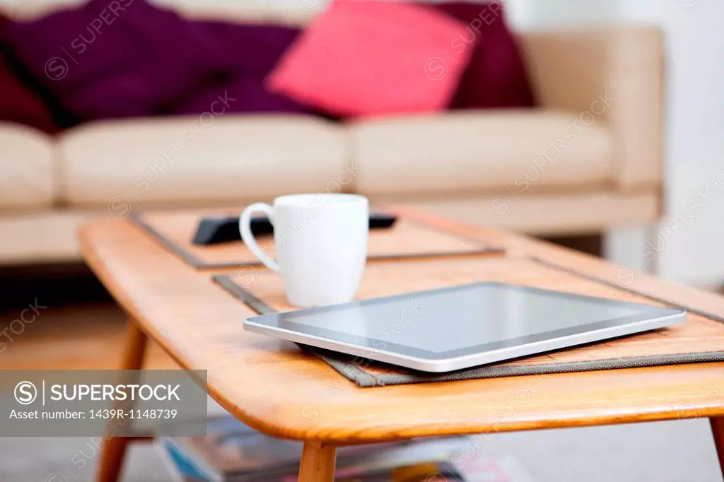 Digital tablet on coffee table