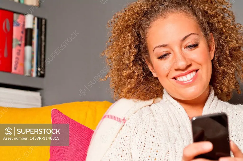 Woman holding cell phone