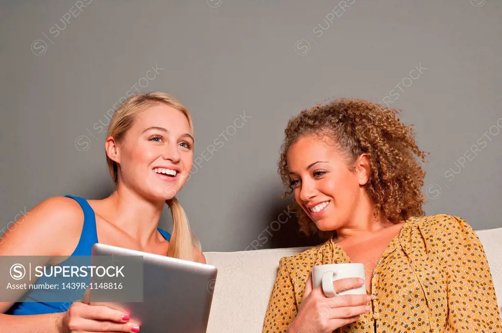 Women with digital tablet