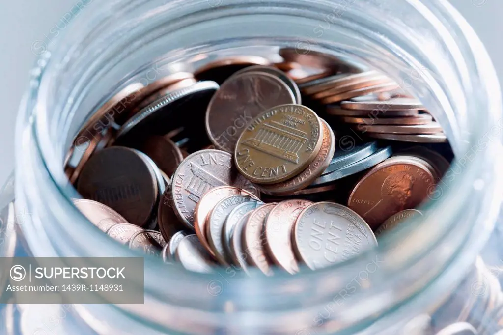 Cent coins in a jar