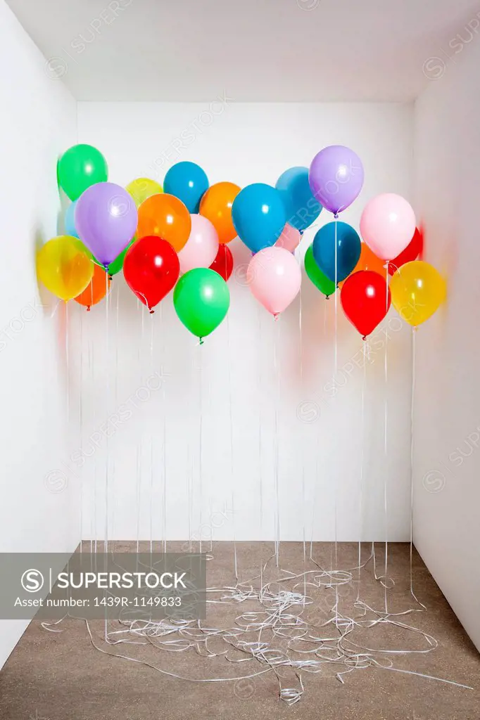 Colorful balloons in a room