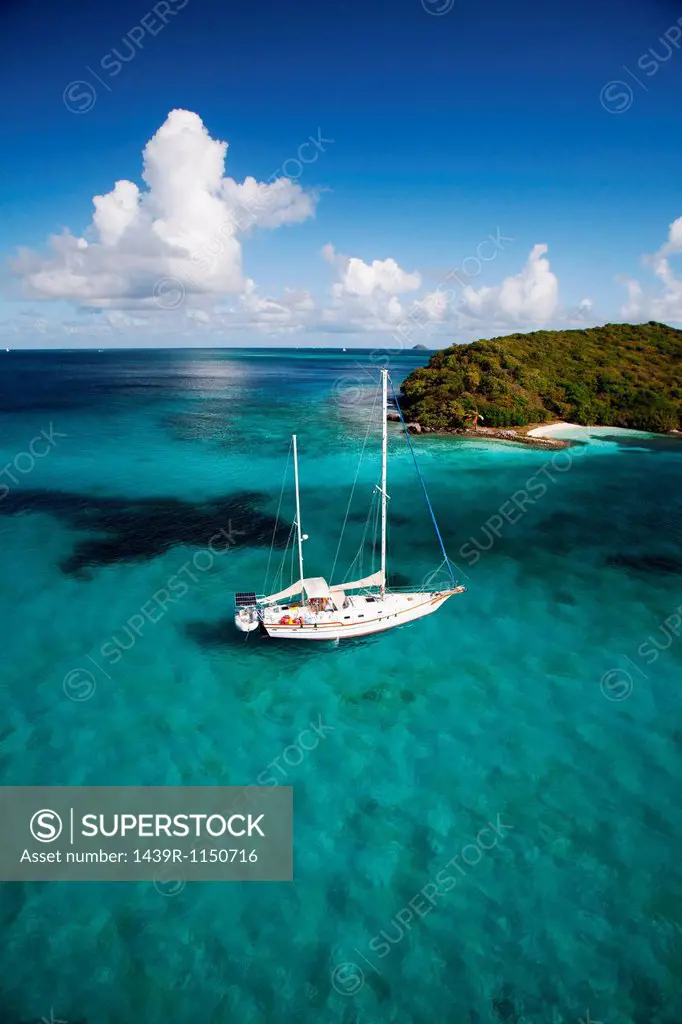 Sailboat in tropical water