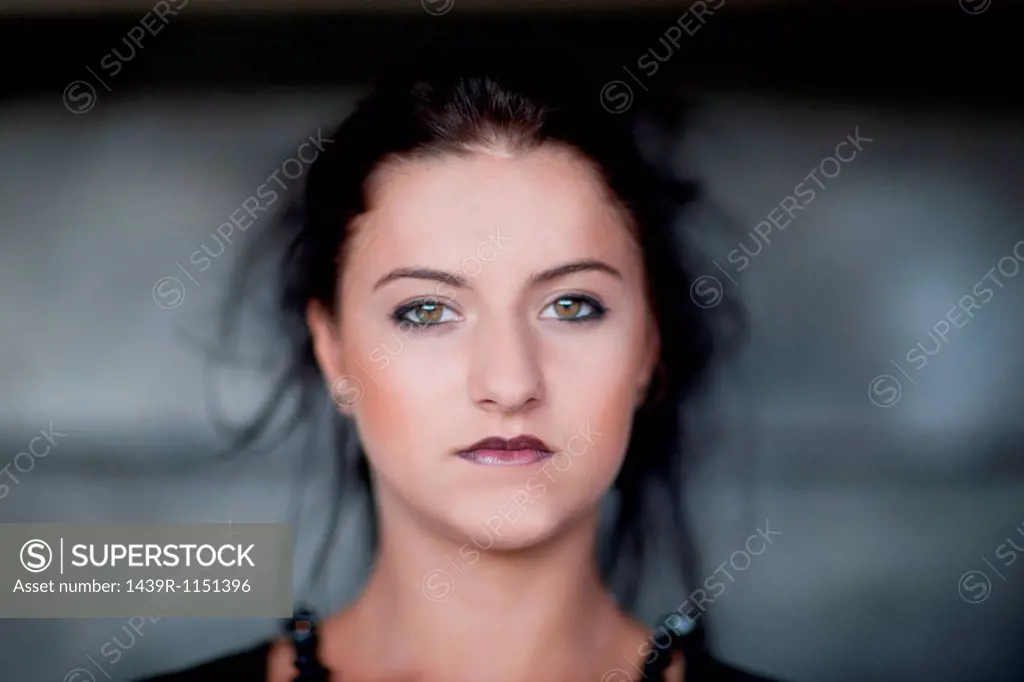 Teenage girl wearing dark makeup