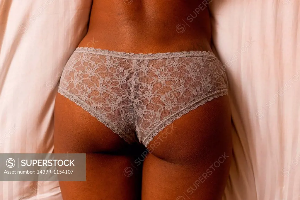 Close up of woman wearing panties - SuperStock