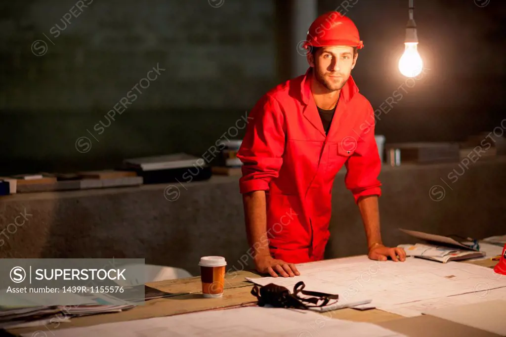 Building contractor working late on site