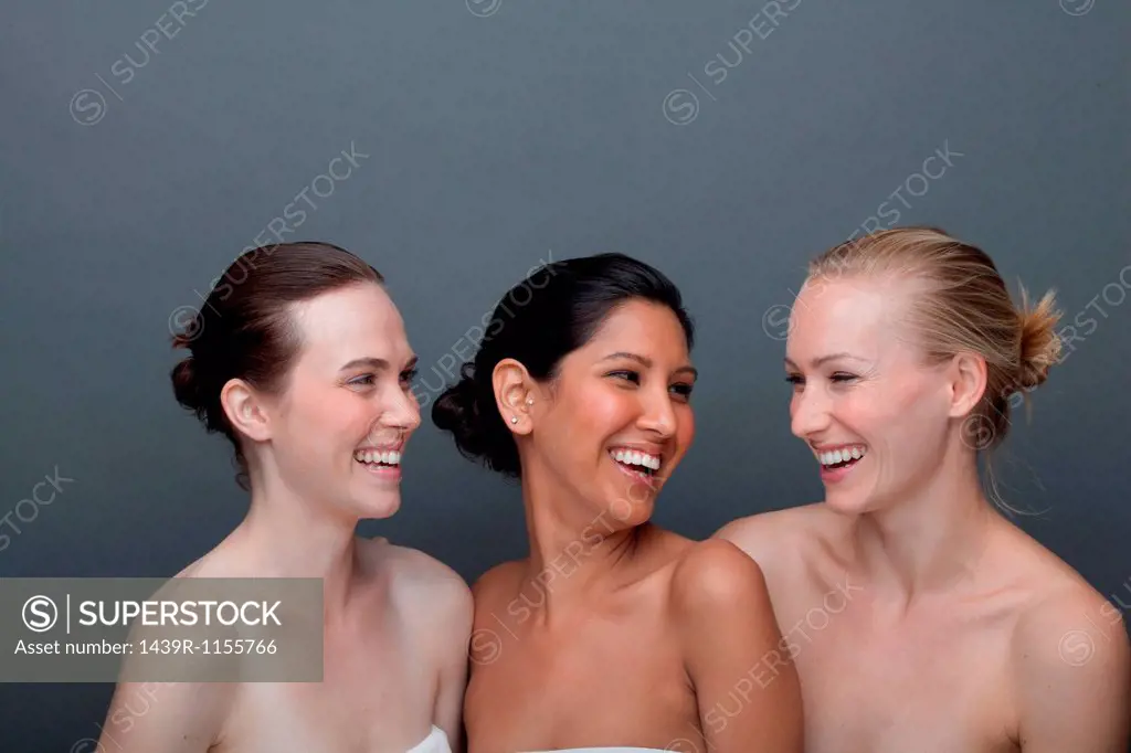 Three young woman laughing