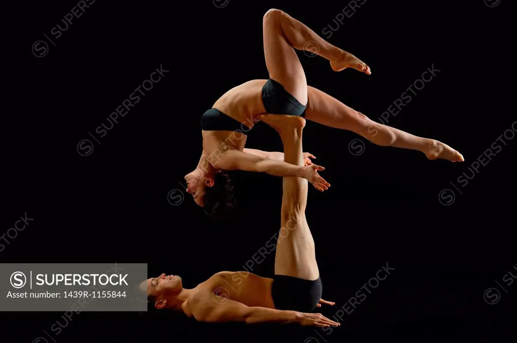 Mid adult couple performing modern dance