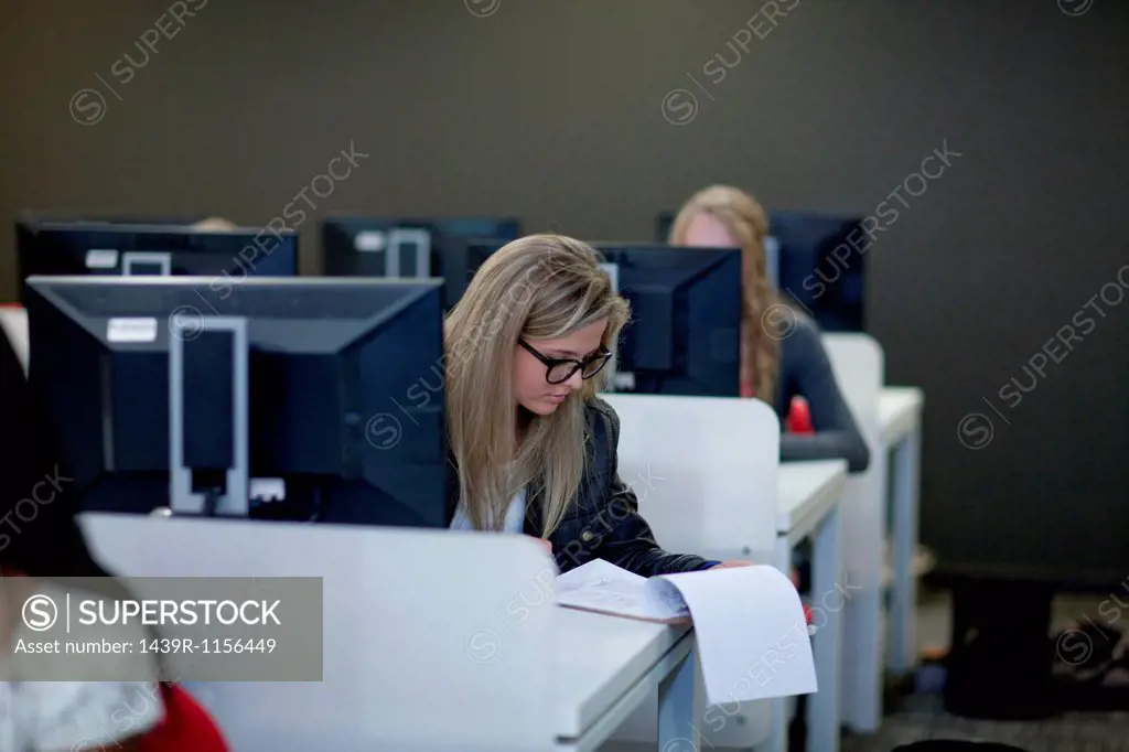 Students using computers in class