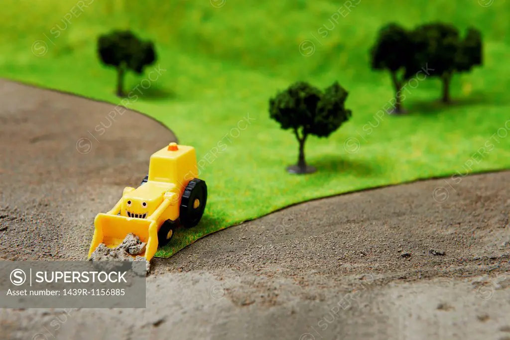 Toy digger on model landscape