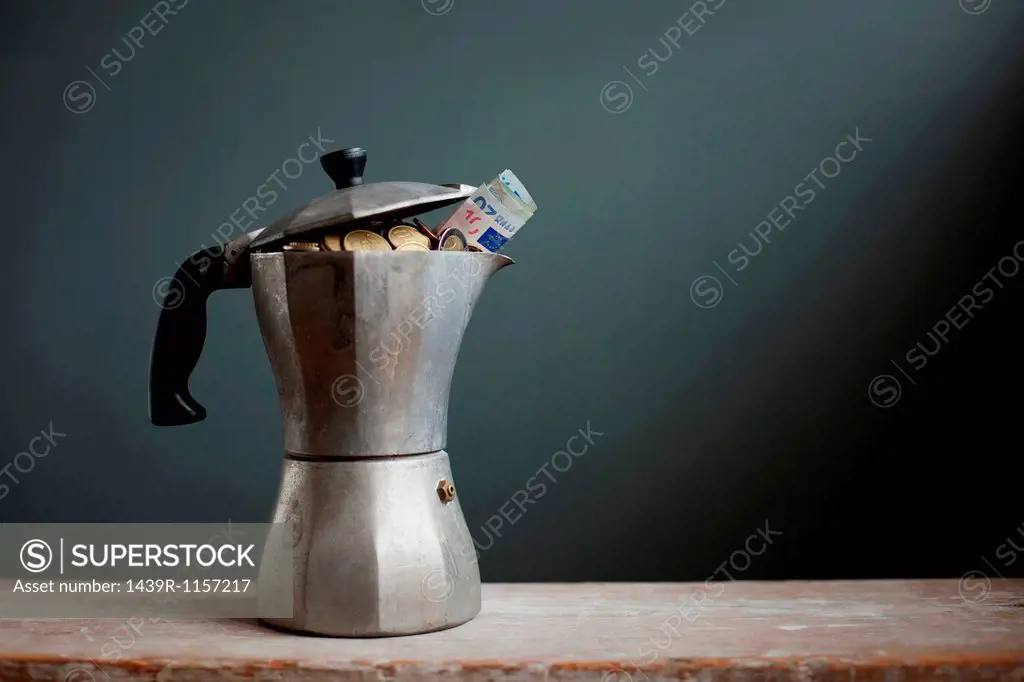 Coffee pot with Euros inside