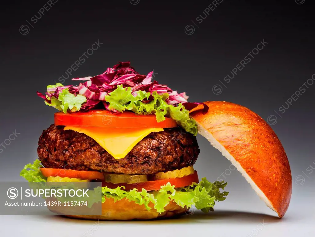 Burger with slice of apple