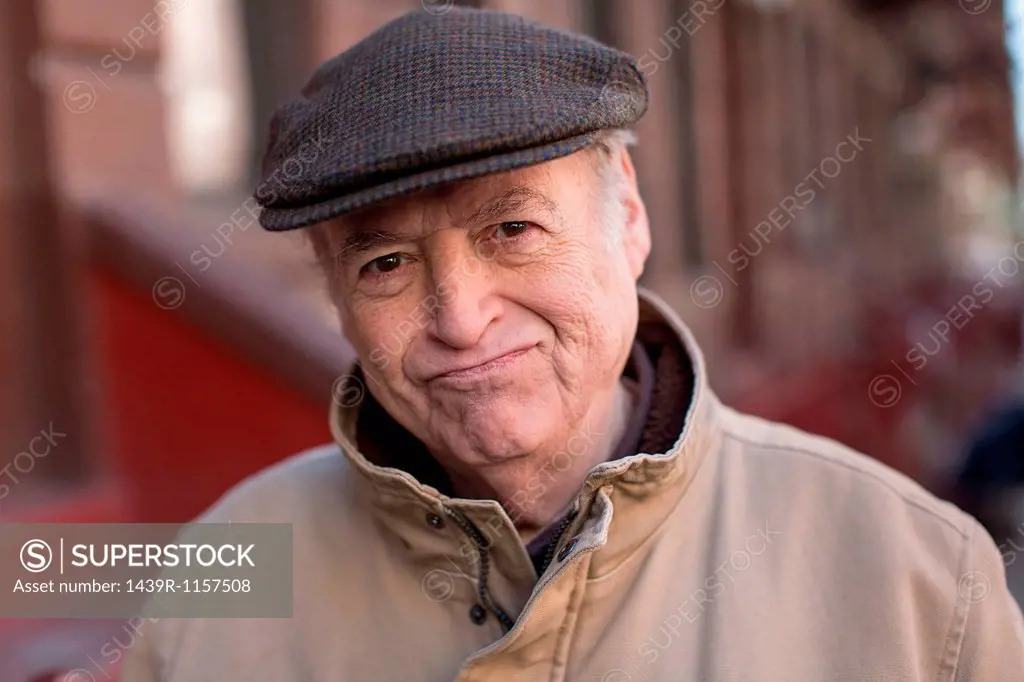 Portrait of senior man in street