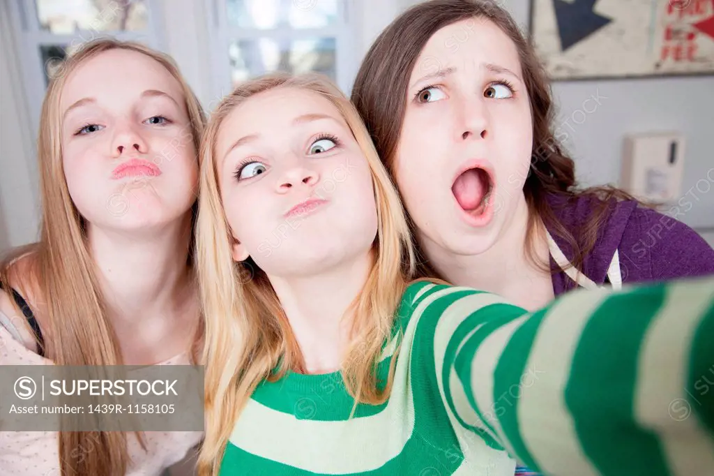 Teenagers pulling funny faces