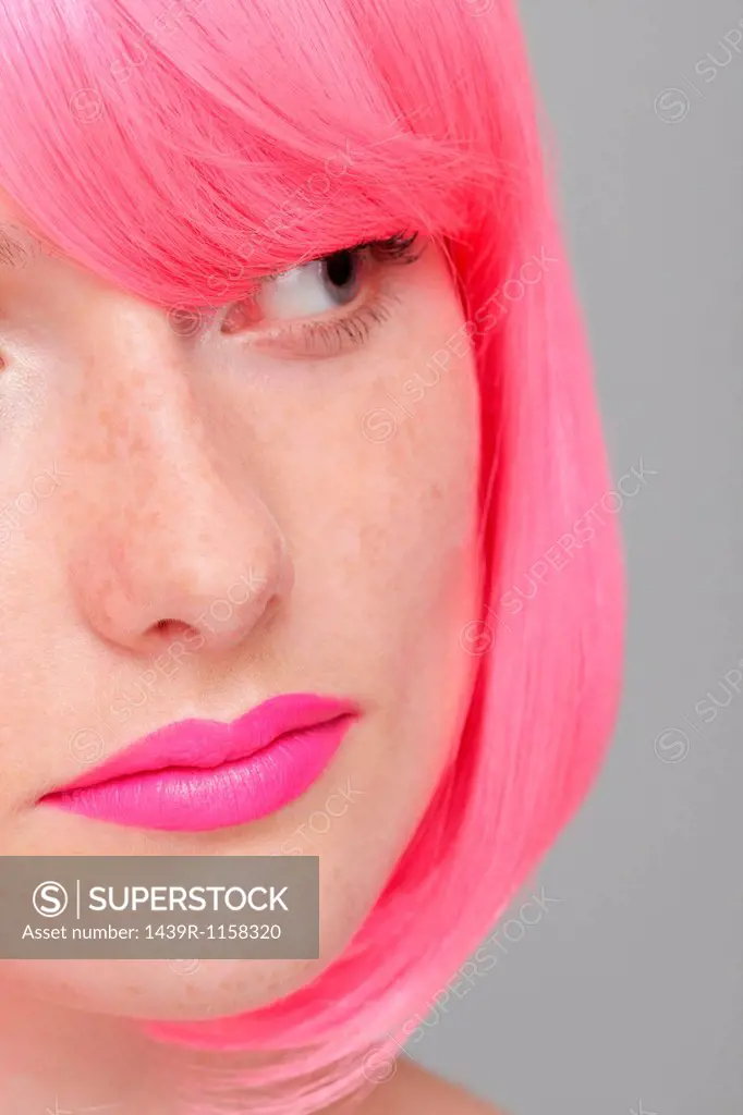 Close up of teenage girl with pink hair