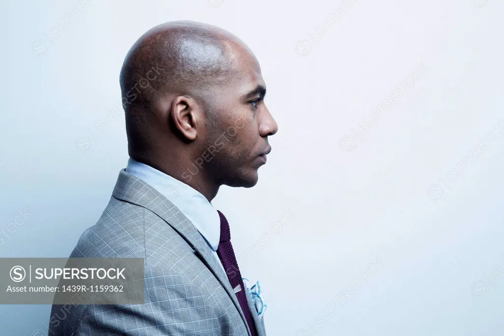 Studio portrait of businessman in profile