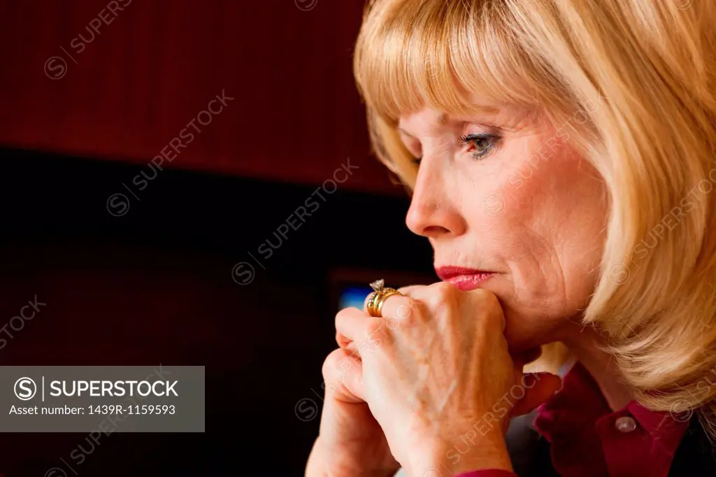 Close up portrait of mature woman looking pensive