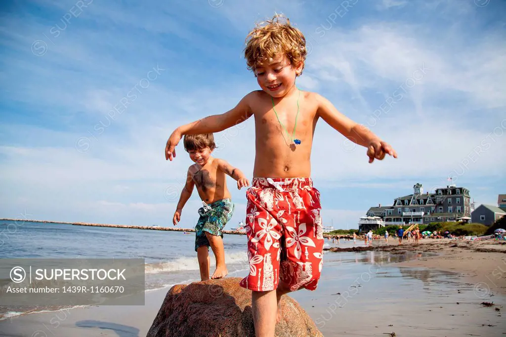 Two boys playing on beach