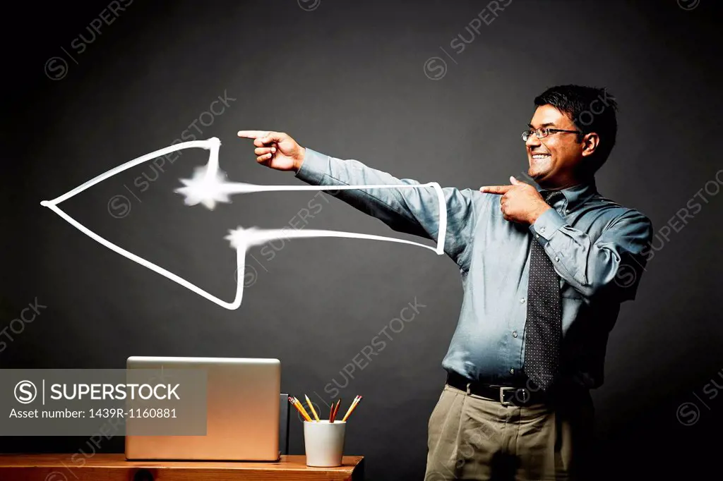 Man pointing the way with a big smile
