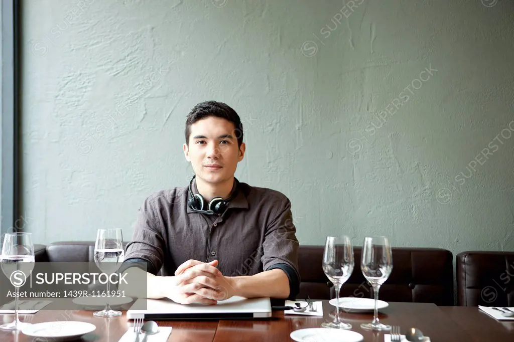 Young man in restaurant, portrait