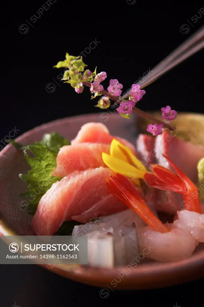 Still life with sushi and flower blossoms