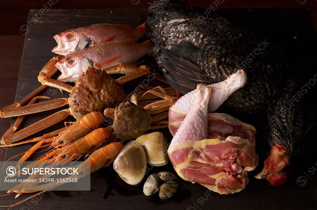 Still life with selection of seafood and chicken