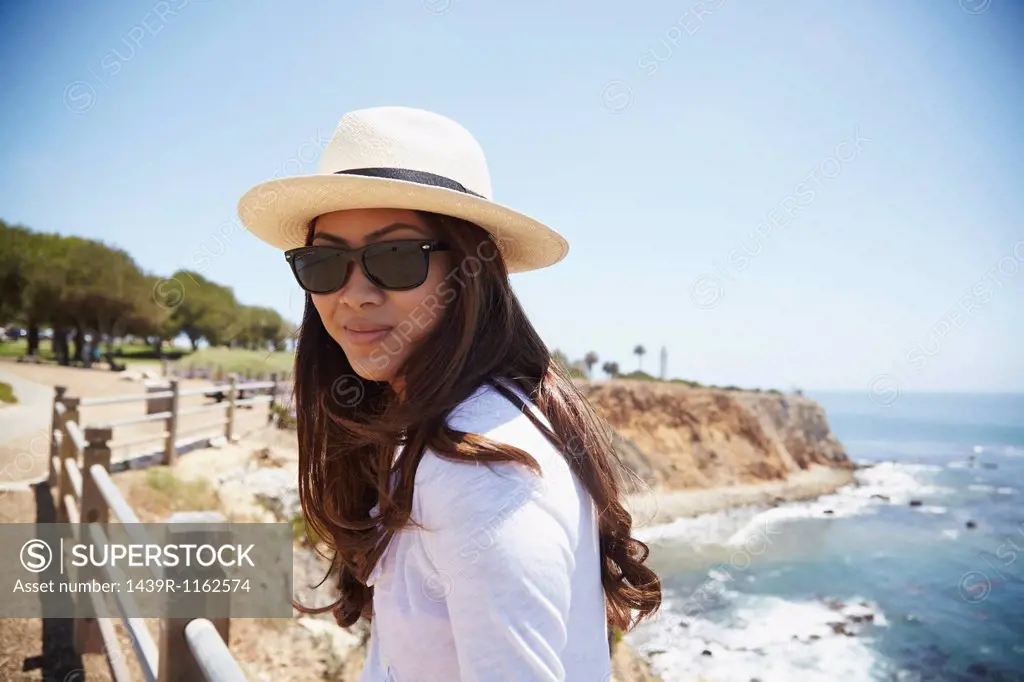 Portrait of young woman wearing sunhat, Palos Verdes, California, USA