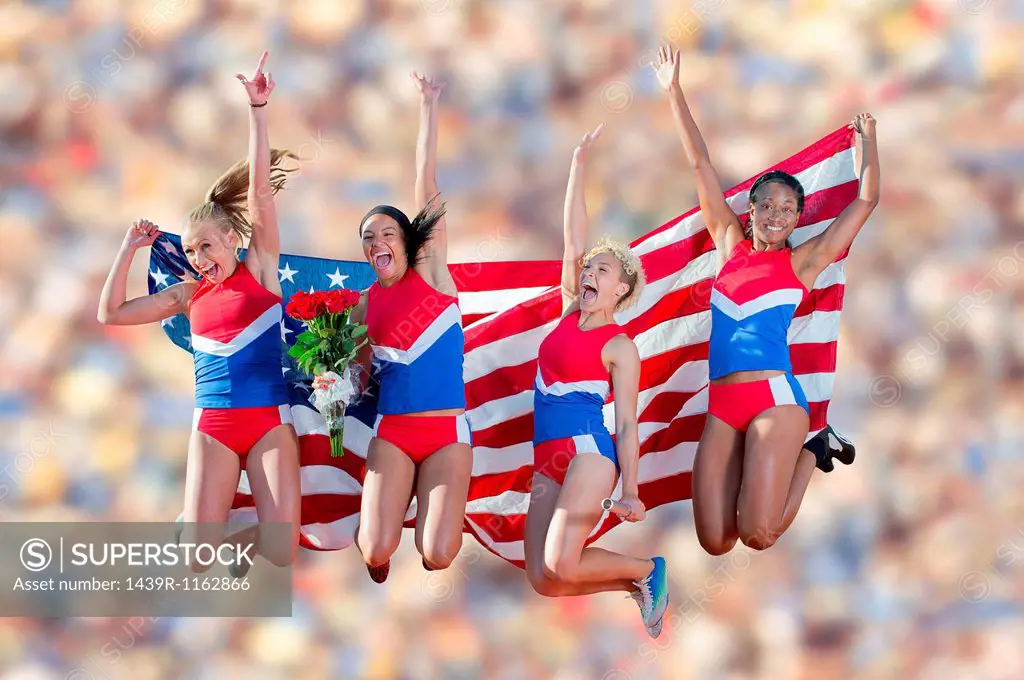 Four American athletes celebrating