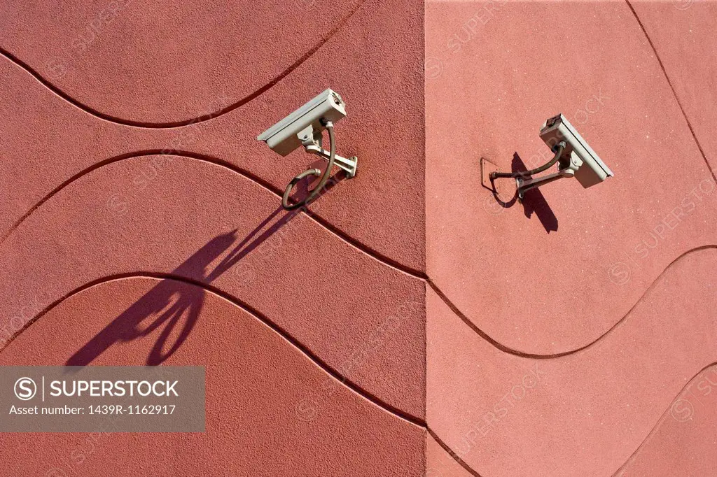 Security cameras on building exterior