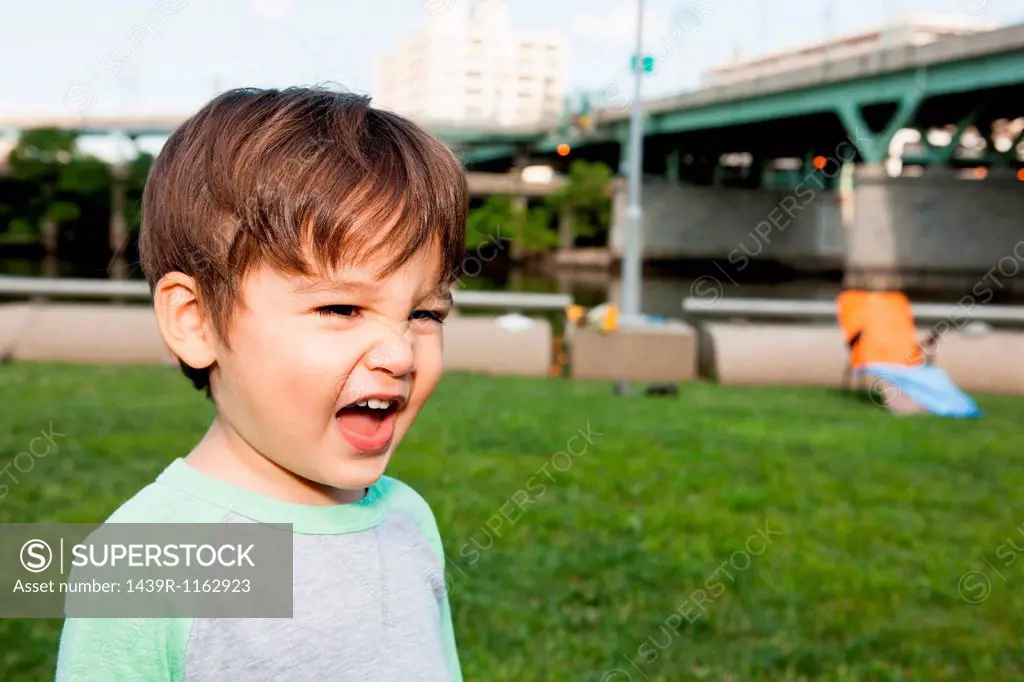 Close up of male toddler making a face