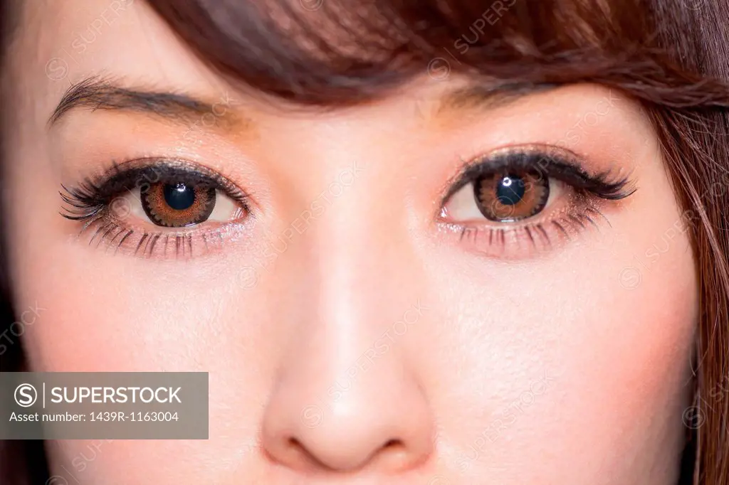 Portrait of woman with brown eyes close up