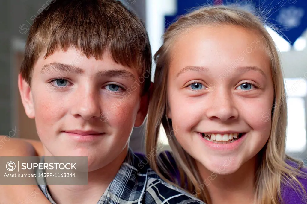 Close up portrait of boy and girl
