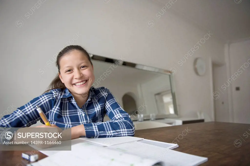 Teenage girl doing homework