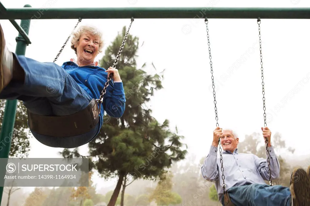 Husband and wife on swing