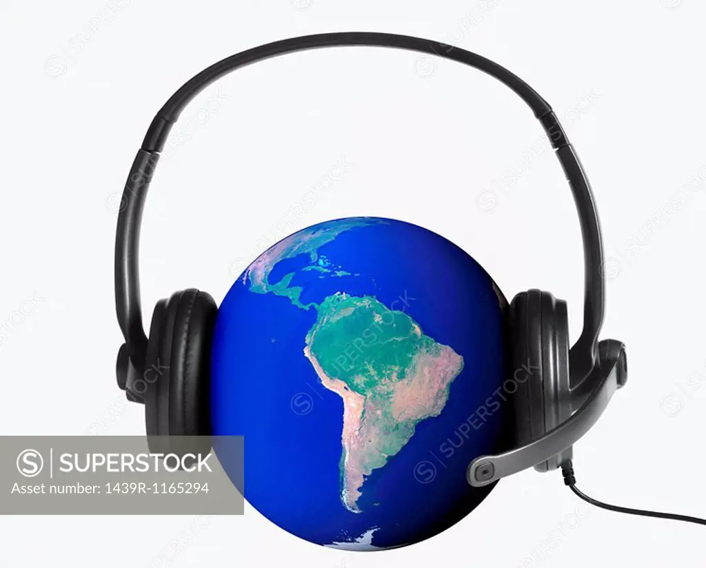 Planet earth wearing a telephone headset