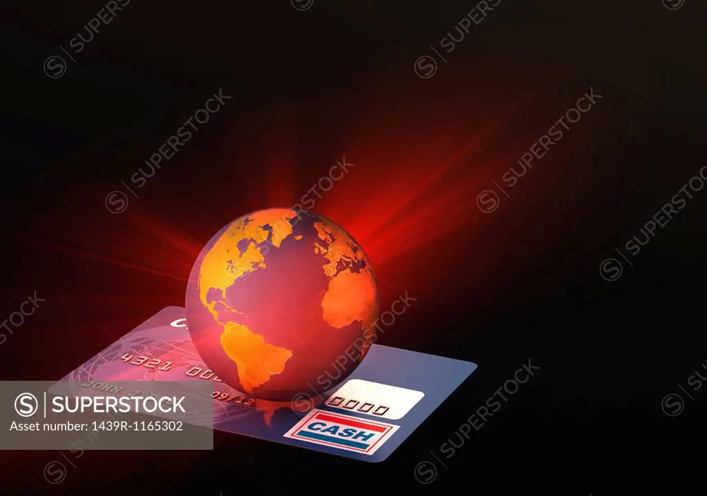 Light coming from globe on credit card