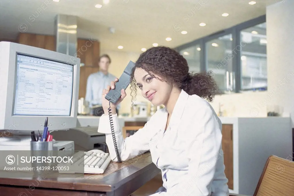Businesswoman on telephone in office