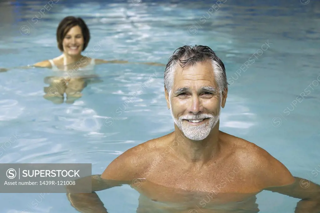 Man and woman in swimming pool