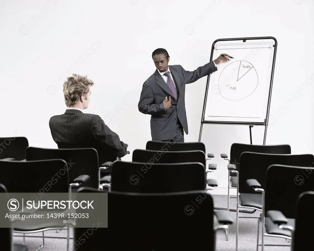 Two businessmen in conference room