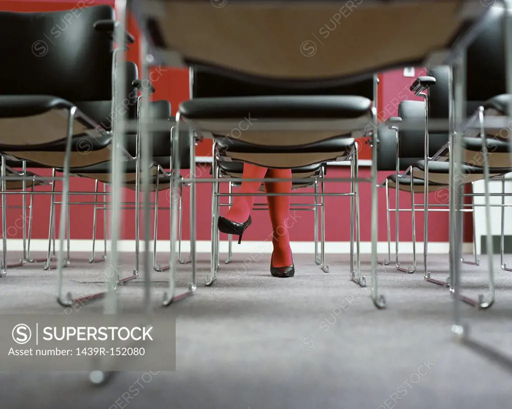 Businesswoman alone in conference room