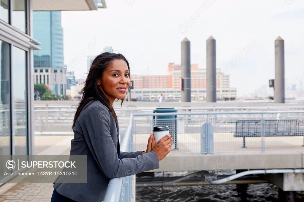 Businesswoman taking coffee break