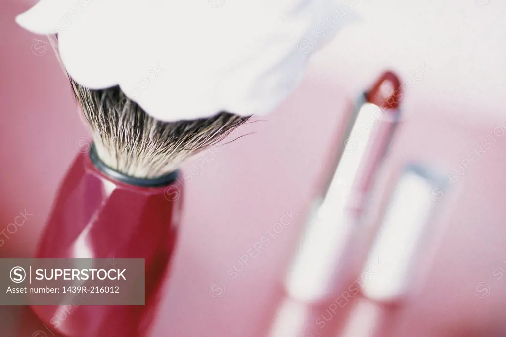 Lipstick and shaving brush