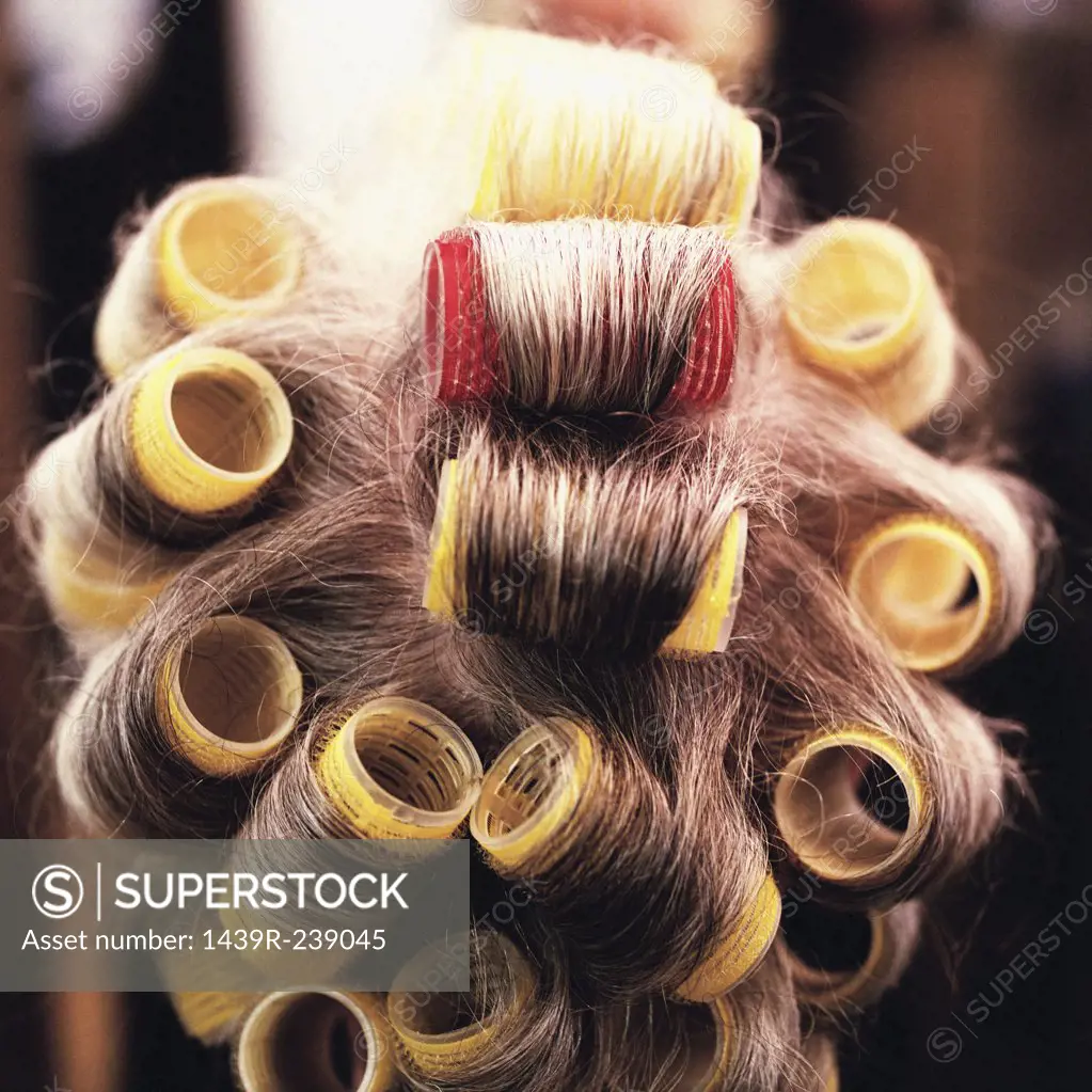 Womans hair in rollers