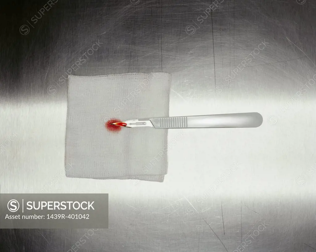 Blood covered scalpel 