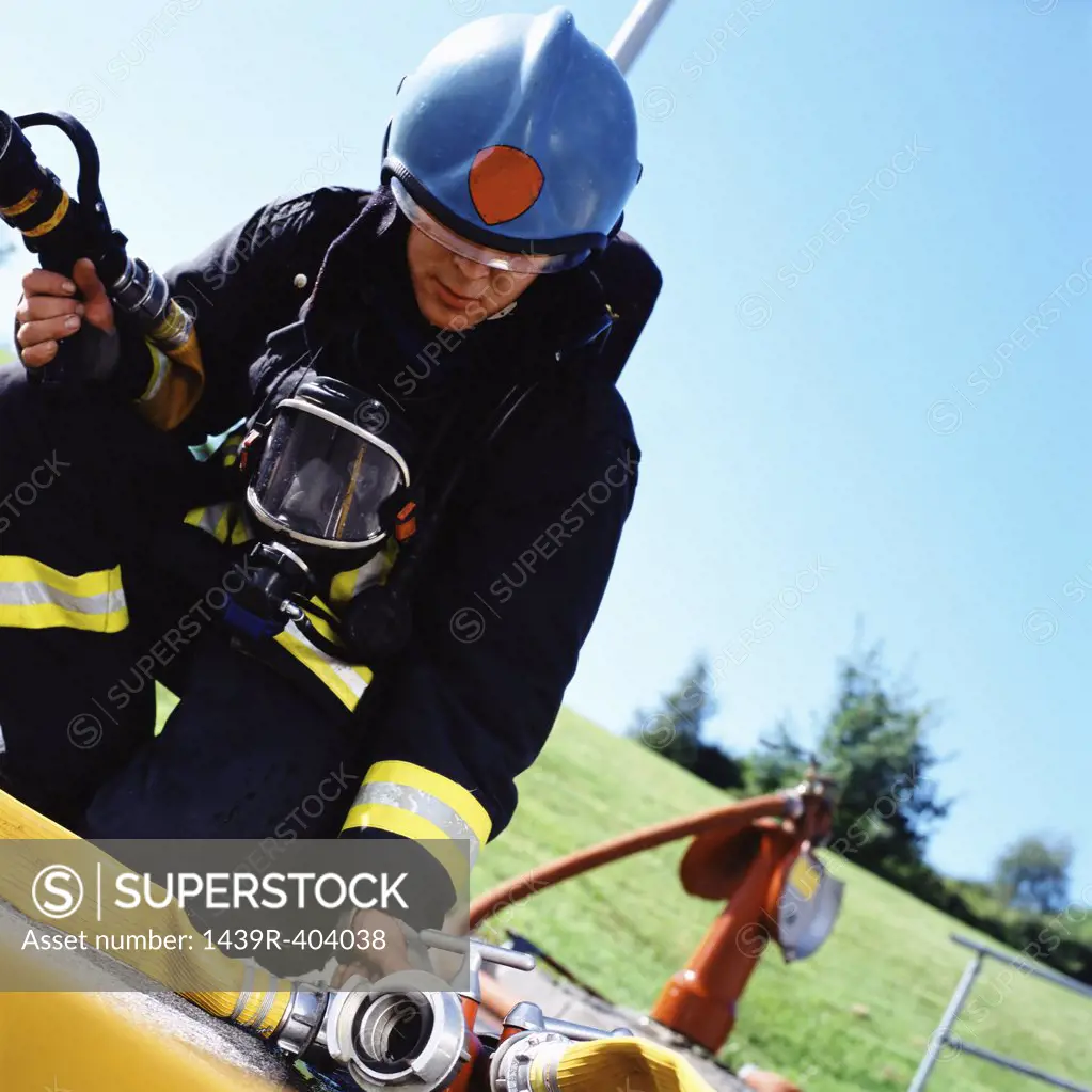 Fireman connecting hoses