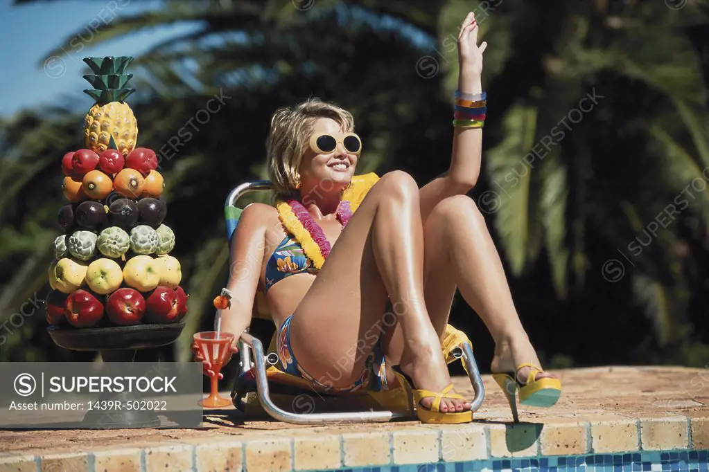Fruit and sunbathing by the pool