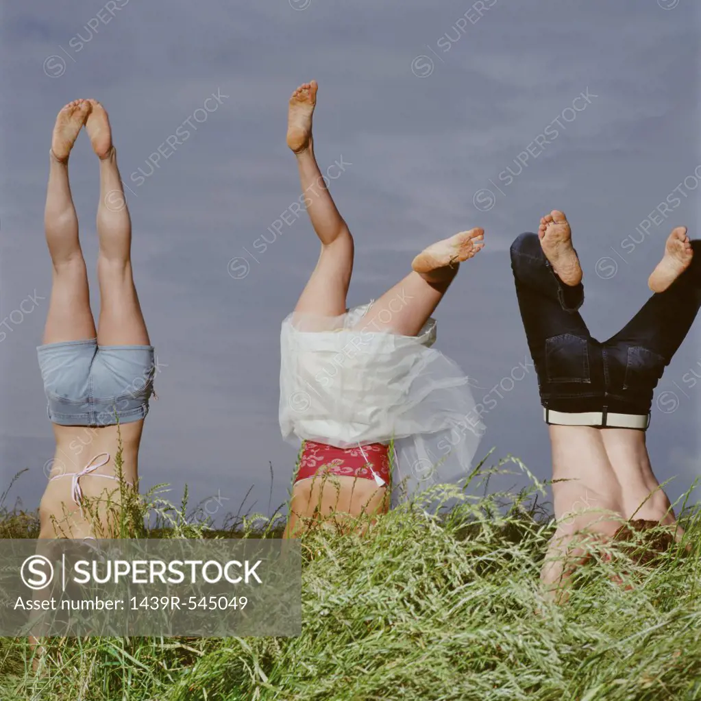 Handstand in a field 