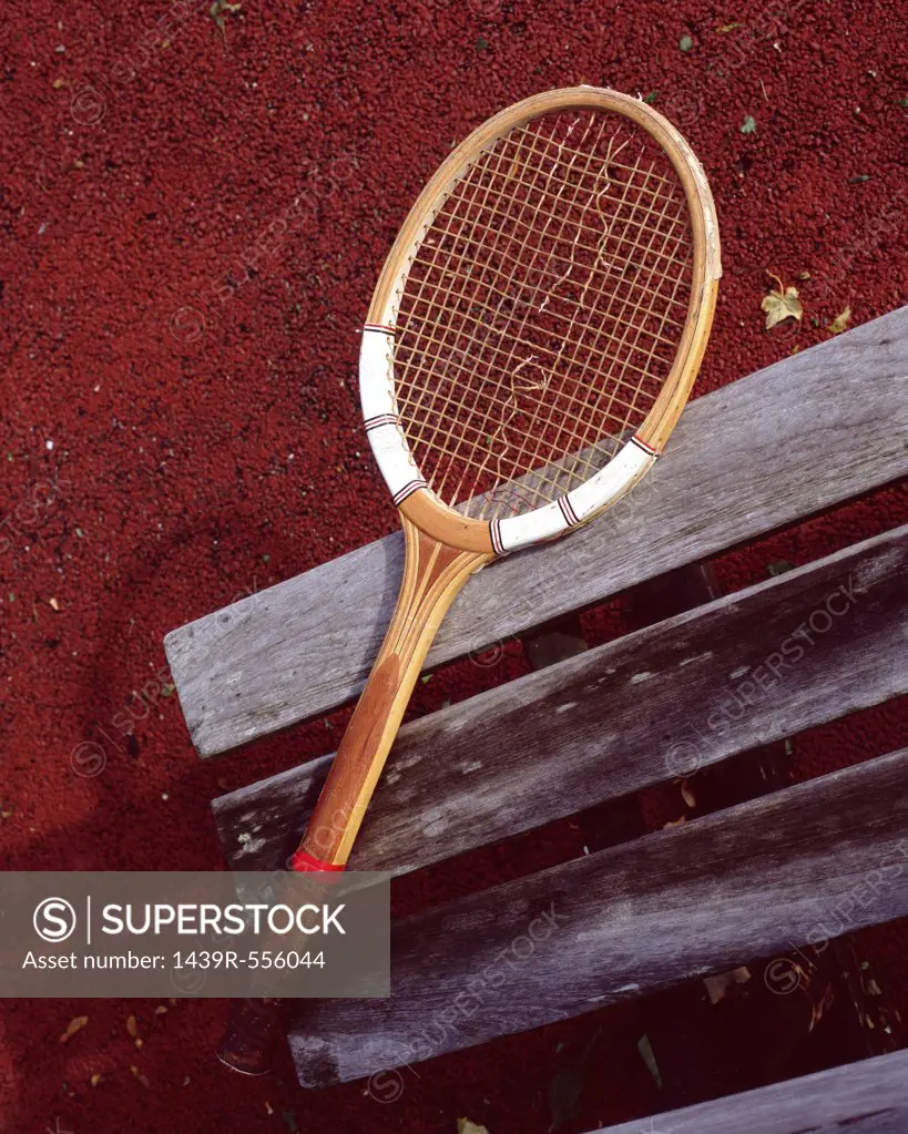Tennis racket on bench