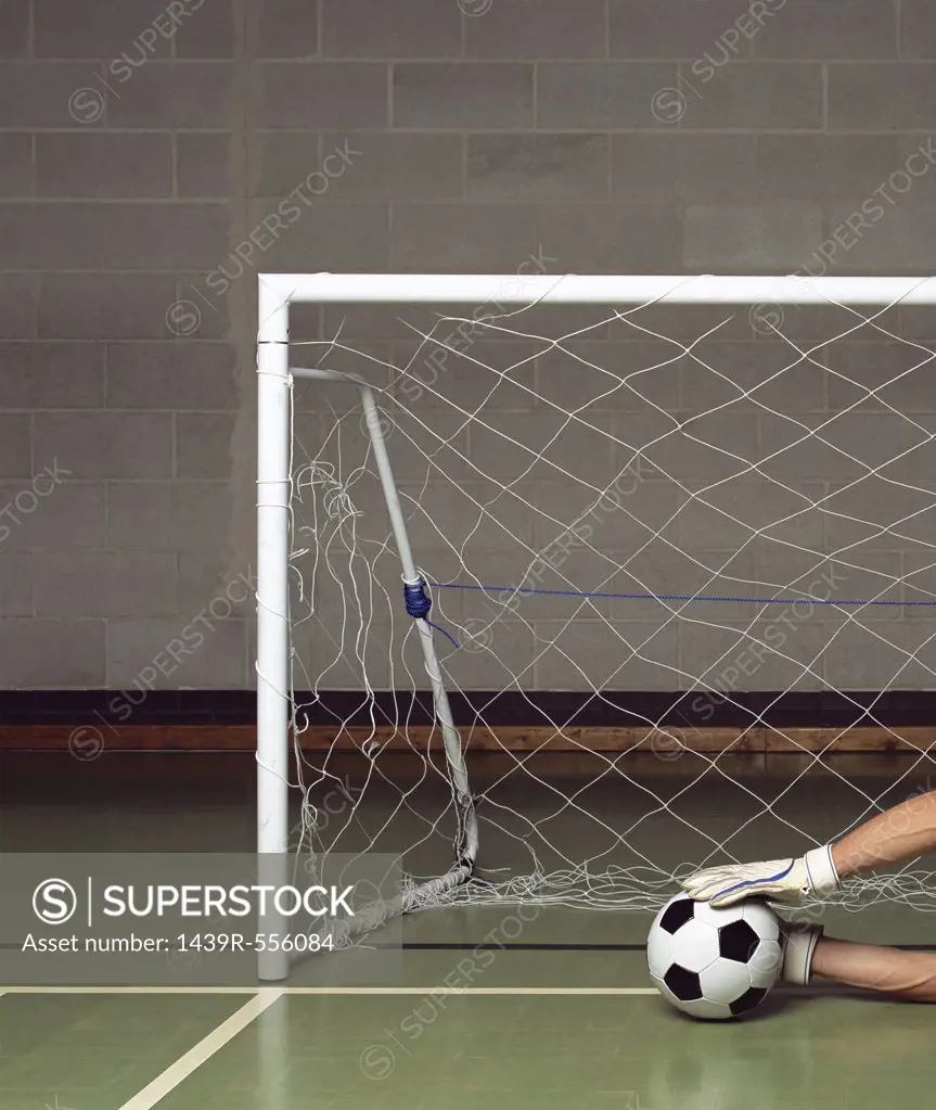 Goalkeeper saving a goal
